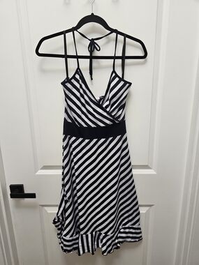 Flirty black and white striped midi dress.